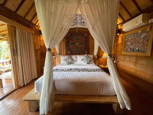 Кровать или кровати в номере Sirya Farm House