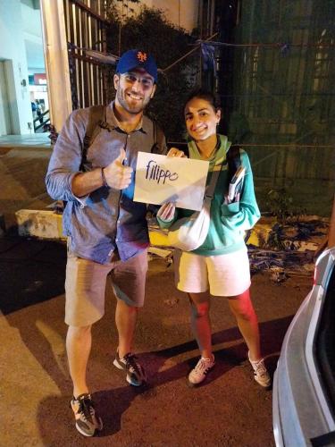 a man and a woman holding up a box at Baansrisuthum in Don Sak