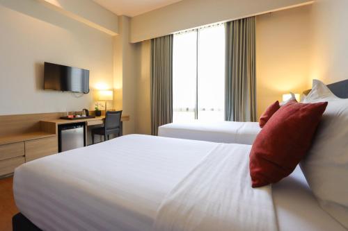 Privato Quezon Cityにあるベッド