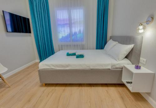 Cama o camas de una habitación en Asaapart Vernyi Room 5