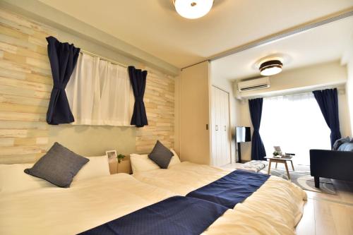 大阪市にあるMA大阪ドーム前のベッドルーム(大型ベッド1台、テレビ付)