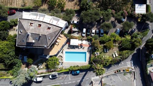 an overhead view of a house with a swimming pool at Hotel Bellavista in San Bartolomeo al Mare