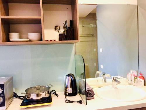 A cozinha ou cozinha compacta de Unique Serviced Apartment
