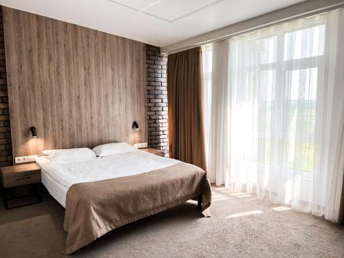 Un pat sau paturi într-o cameră la Aleanda