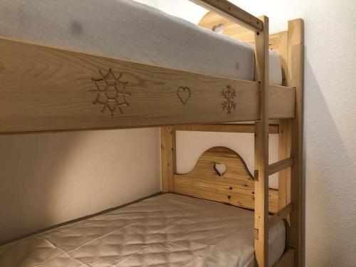 a bunk bed in a room with a bunk bed in a room at Nice Appt In Briançon Les Charmettes in Briançon