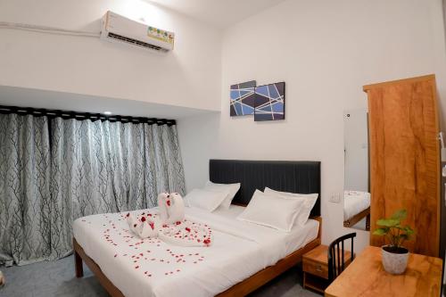 Postel nebo postele na pokoji v ubytování Hotel Royal Accord