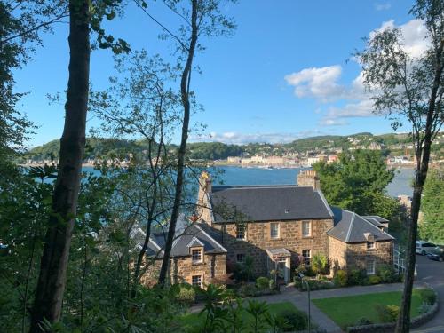 a house with a view of a lake at The Manor House in Oban