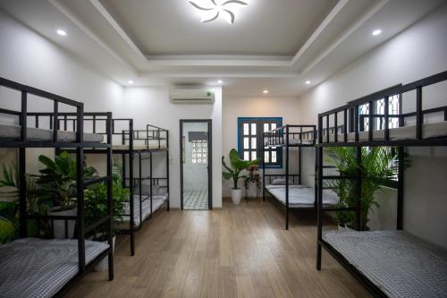 Postel nebo postele na pokoji v ubytování Vungtau Surf House - Hostel Surf Camp