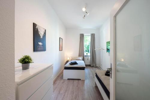 Ένα ή περισσότερα κρεβάτια σε δωμάτιο στο Work & Stay in Mannheim