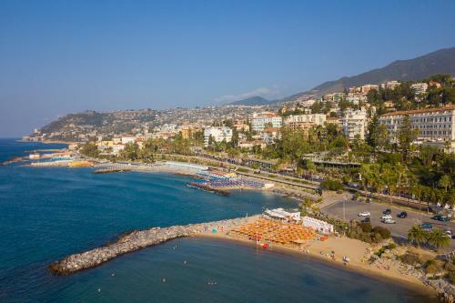 an aerial view of a beach near the water at Seven Suites Apartments - Via Matteotti 178 in Sanremo