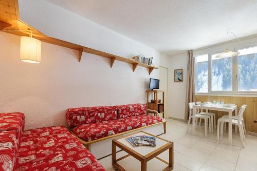 Televízia a/alebo spoločenská miestnosť v ubytovaní Chamonix Sud - Bâtiment E 421 - Happy Rentals