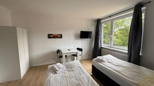 Postel nebo postele na pokoji v ubytování 3-Zimmer Monteurwohnung mit Balkon