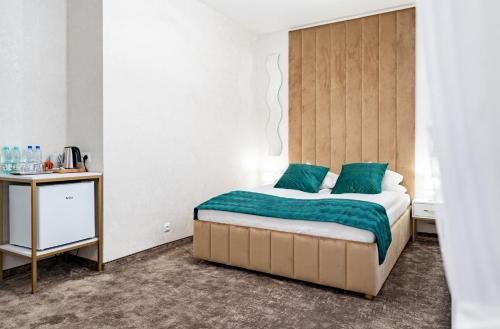 Una cama o camas en una habitación de Gotyk