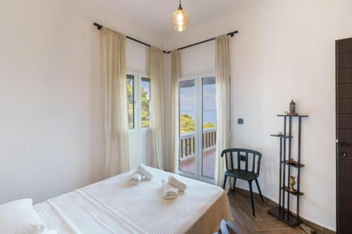 Ένα ή περισσότερα κρεβάτια σε δωμάτιο στο villa Blu: Beachfront home with amazing view