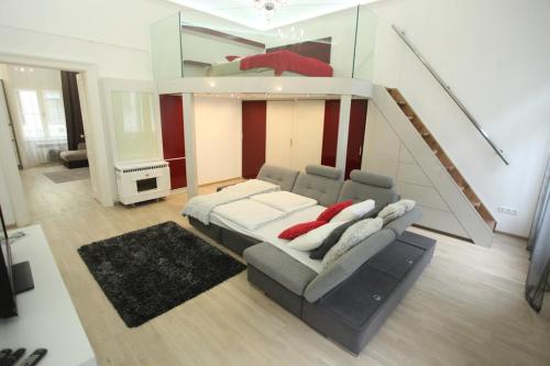 Posteľ alebo postele v izbe v ubytovaní Superior Loft at Basilica