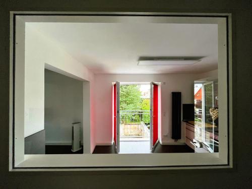 a mirror on a wall in a room at Ferienwohnung Richard in Zittau