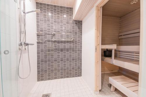 Koupelna v ubytování The Luxury Downtown Rovaniemi