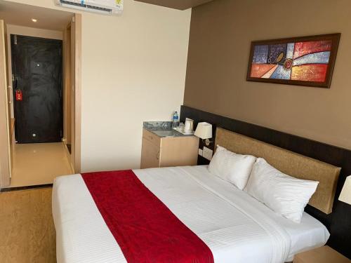 Postel nebo postele na pokoji v ubytování Hotel West End