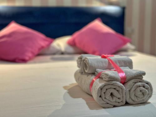 Santo Apartment in Trastevereにあるベッド