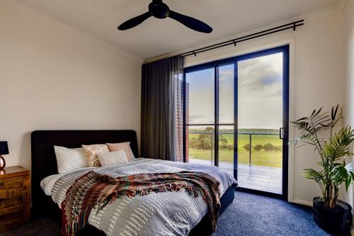 מיטה או מיטות בחדר ב-Wamoon Retreat - Luxe House