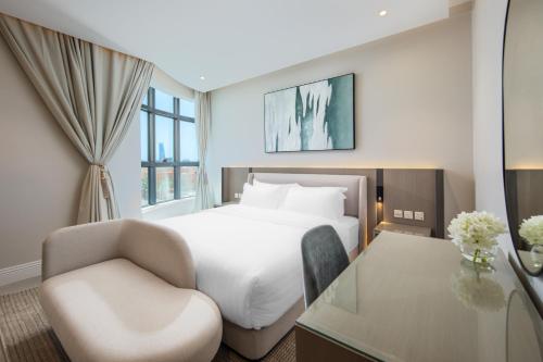 Postel nebo postele na pokoji v ubytování Merya Hotel Apartment - Zahra