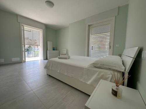 Postel nebo postele na pokoji v ubytování white B&B