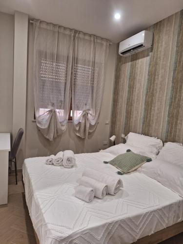 Postel nebo postele na pokoji v ubytování DOMUS 0143