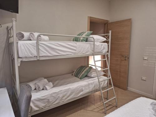 Postel nebo postele na pokoji v ubytování DOMUS 0143