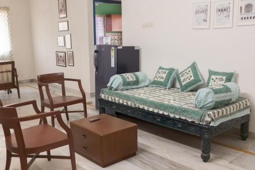 Cama o camas de una habitación en Ashray - Vintage Homes