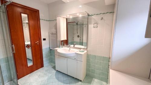 a bathroom with a sink and a mirror at B&B Villa Irma in Sorrento