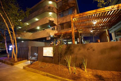 a building with a sign in front of it at Townhouse Hotel in Wagga Wagga