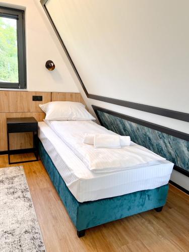 Postel nebo postele na pokoji v ubytování MANGATA