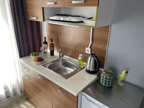 Kuchyň nebo kuchyňský kout v ubytování Flats Company - Karakoy Apartment