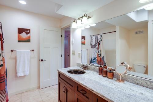 a bathroom with a sink and a mirror at Modern Bellingham Retreat Near Galbraith Mountain! in Bellingham