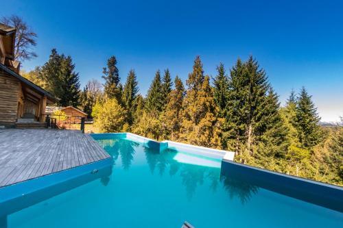 Bazén v ubytování Cabañas Ruca Kuyen Golf & Resort nebo v jeho okolí