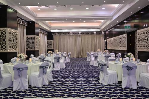 a set up for a banquet in a banquet hall at Retaj Al Rayyan in Doha