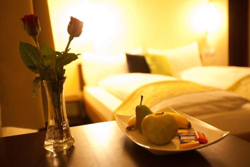 Letto o letti in una camera di Hotel Goldener Schlüssel