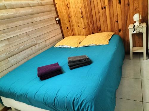 Postel nebo postele na pokoji v ubytování Gîte chez Kaky