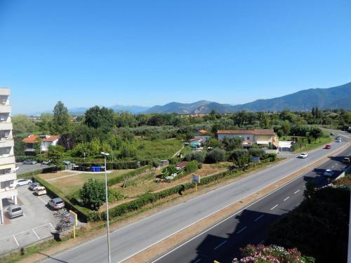 a view of a road in a small town at B&B L'Orchidea in Pisa