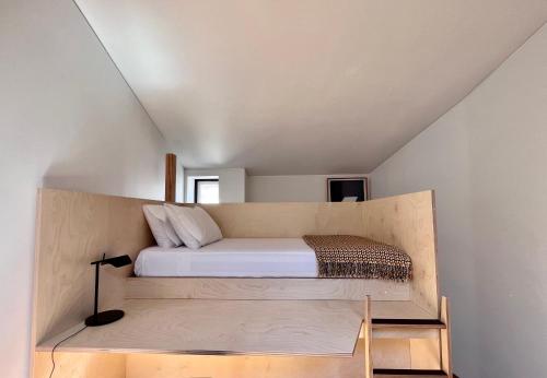 Posteľ alebo postele v izbe v ubytovaní SOBRE RIBAS 12