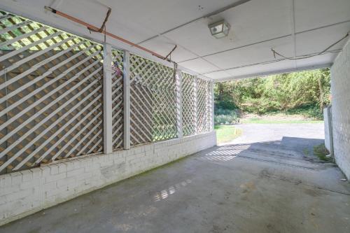 an empty room with a fence on the side of a building at Bethesda Apartment and Yard about 9 Mi to D C in Bethesda