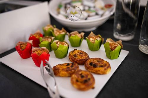a white plate of food on a table at Rupestre Arts Hotel Ródão in Vila Velha de Ródão