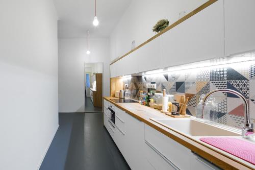 a kitchen with a sink and a counter top at Best Place in Prague in Prague