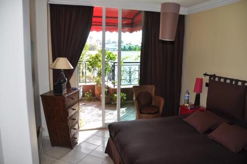Et sittehjørne på Appartement agréable avec 2 très belles terrasses au coeur de Rabat