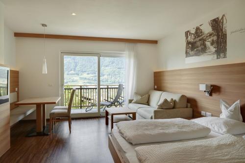 Ένα ή περισσότερα κρεβάτια σε δωμάτιο στο Apartments Oberdorner