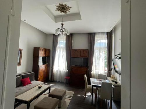 a living room with a couch and a table at Apartment Romana in Sarajevo