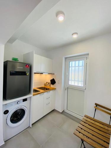 Kuchyň nebo kuchyňský kout v ubytování Olive tree cottage