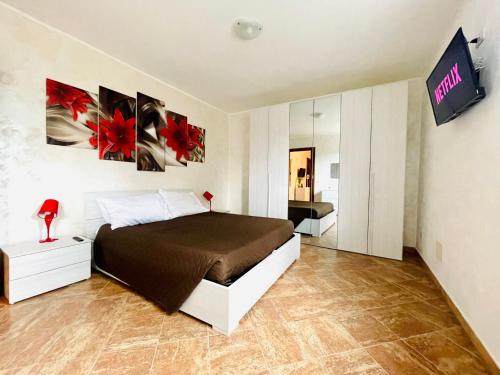 A bed or beds in a room at [La Casina Del Colle] Confort,Centrale,P. Gratuito.