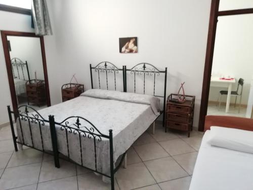 Ένα ή περισσότερα κρεβάτια σε δωμάτιο στο Residenza Del Sole