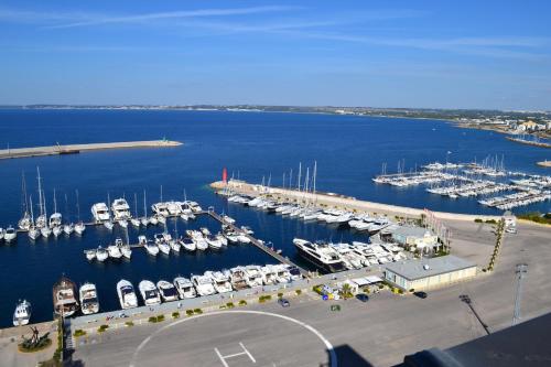 an aerial view of a marina with boats in the water at Hotel Bellavista Club-Caroli Hotels in Gallipoli